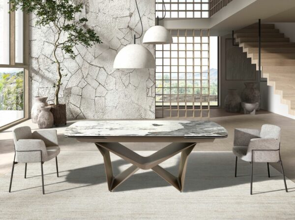 Mesa comedor extensible ovalada barril mármol porcelánico y acero taupé metalizado