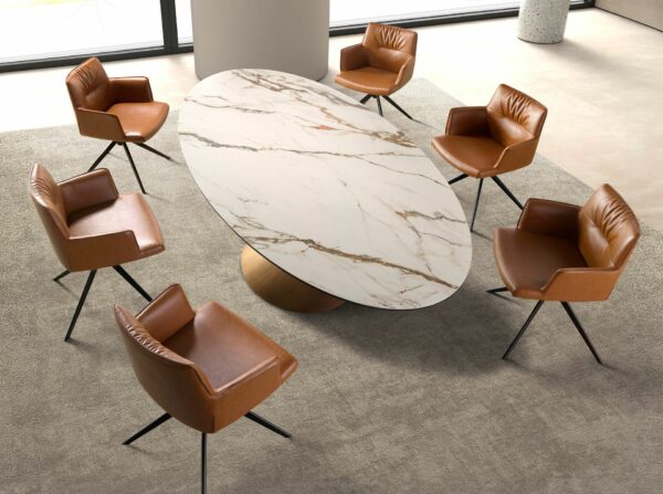 Mesa comedor ovalada mármol porcelánico y acero color bronce